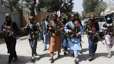Taliban fighters patrol in the Wazir Akbar Khan neighborhood in the city of Kabul, Afghanistan. (AP Photo)