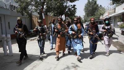Taliban fighters patrol in the Wazir Akbar Khan neighbourhood in Kabul, on Wednesday. (AP Photo) Taliban fighters patrol in the Wazir Akbar Khan neighbourhood in Kabul, on Wednesday. (AP Photo)