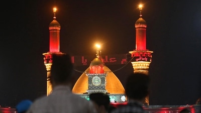 Iraqi Shiite Muslims take part in a mourning procession during the month of Muharram in Karbala. (AFP Photo)