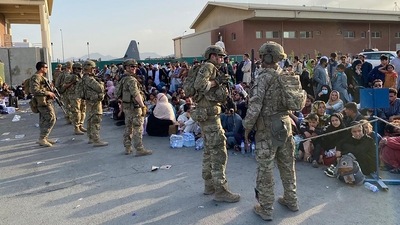 G7 called for the militants to guarantee safe passage to Afghan nationals and foreigners who want to leave the country. In picture - US soldiers stand guard as Afghan people wait to board a military aircraft to leave Afghanistan at the airport in Kabul. (AFP) G7 called for the militants to guarantee safe passage to Afghan nationals and foreigners who want to leave the country. In picture - US soldiers stand guard as Afghan people wait to board a military aircraft to leave Afghanistan at the airport in Kabul. (AFP)