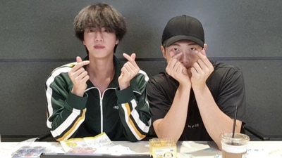 BTS members RM and Jin.