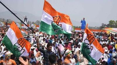Congress supporters with Congress flags ahead of a rally. (File photo) Congress supporters with Congress flags ahead of a rally. (File photo)