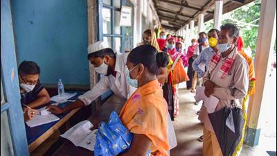 Beneficiaries wait in a queue for their Covid-19 vaccine dose, at a centre in Nagaon, Assam,on August 18. (PTI)