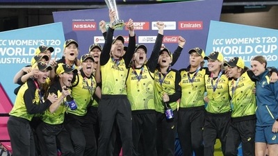 Australian players celebrate their win over India in the Women's T20 World Cup cricket final. File (AP) Australian players celebrate their win over India in the Women's T20 World Cup cricket final. File (AP)
