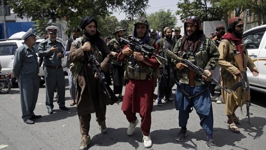 Taliban fighters patrol a street in Kabul, Afghanistan, on Thursday.(AP)