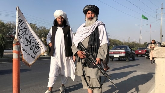 A Taliban fighter holding an M16 assault rifle stands outside the Interior Ministry in Kabul, Afghanistan, on August 16, 2021. (File Photo)