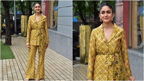 Mrunal wore the blazer with high-waisted flared pants in the same print. Her ensemble served strong retro vibes, and we are in love with it. (HT Photo/Varinder Chawla)