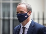 Britain's Foreign Secretary Dominic Raab walks outside Downing Street, in London, Britain.