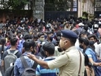 Students flout social distancing as they wait for entry at Doranda College in Ranchi.