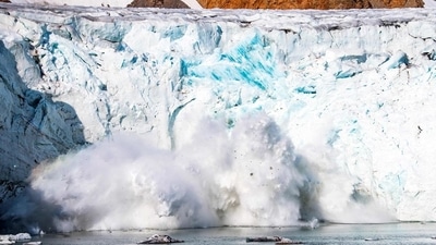 Greenland’s ice sheet seeing rainfall for the first time in recorded history is a worrying sign for climate scientists. (AFP)
