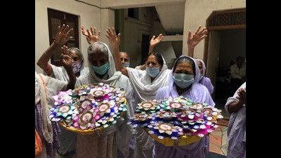 Widows in Vrindavan with the ‘rakhis’ which they made and later sent to PM Narendra Modi. (HT photo) Widows in Vrindavan with the ‘rakhis’ which they made and later sent to PM Narendra Modi. (HT photo)