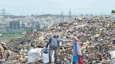 Garbage depot at Uruli Devachi in Pune. PMC to raise compound wall to prevent encroachments at the depot. (HT) Garbage depot at Uruli Devachi in Pune. PMC to raise compound wall to prevent encroachments at the depot. (HT)