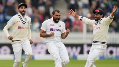 India's Mohdohammed Shami, centre, celebrates after taking the wicket of England's Dom Sibley. (AP) India's Mohdohammed Shami, centre, celebrates after taking the wicket of England's Dom Sibley. (AP)