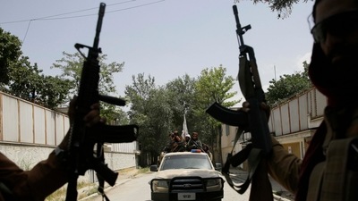 Taliban fighters patrol in Kabul, Afghanistan (AP Photo)