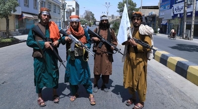 Afghans are trying to flee their country after the Taliban took over. (AFP Photo) Afghans are trying to flee their country after the Taliban took over. (AFP Photo)