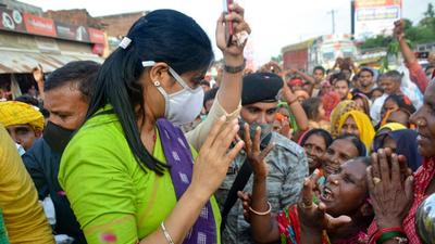 Apna Dal MP and minister of state for commerce and industry Anupriya Patel interacts with her supporters during her Jan Ashirwad Yatra in Mirzapur on Thursday, August 19. (PTI) Apna Dal MP and minister of state for commerce and industry Anupriya Patel interacts with her supporters during her Jan Ashirwad Yatra in Mirzapur on Thursday, August 19. (PTI)