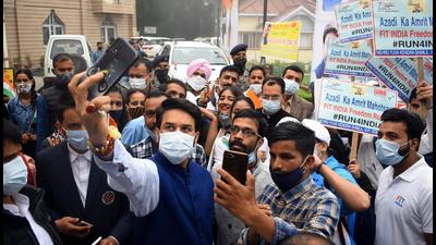 Union minister Anurag Thakur takes a selfie with participants of an event in Shimla on Friday. (Deepak Sansta/HT) Union minister Anurag Thakur takes a selfie with participants of an event in Shimla on Friday. (Deepak Sansta/HT)
