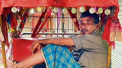 Isn’t the rickshaw dressed up like a dulhan, a bride, he asks. (Mayank Austen Soofi) Isn’t the rickshaw dressed up like a dulhan, a bride, he asks. (Mayank Austen Soofi)
