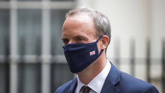 Britain's Foreign Secretary Dominic Raab walks outside Downing Street, in London, Britain.(Reuters / File)