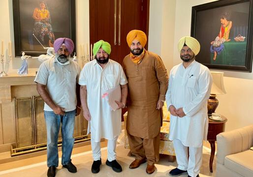 (From left) Punjab Congress general secretary (organisation) Pargat Singh, chief minister Capt Amarinder Singh, state party chief Navjot Singh Sidhu and working president Kuljit Singh Nagra at the meeting on Friday. (HT Photo) (From left) Punjab Congress general secretary (organisation) Pargat Singh, chief minister Capt Amarinder Singh, state party chief Navjot Singh Sidhu and working president Kuljit Singh Nagra at the meeting on Friday. (HT Photo)