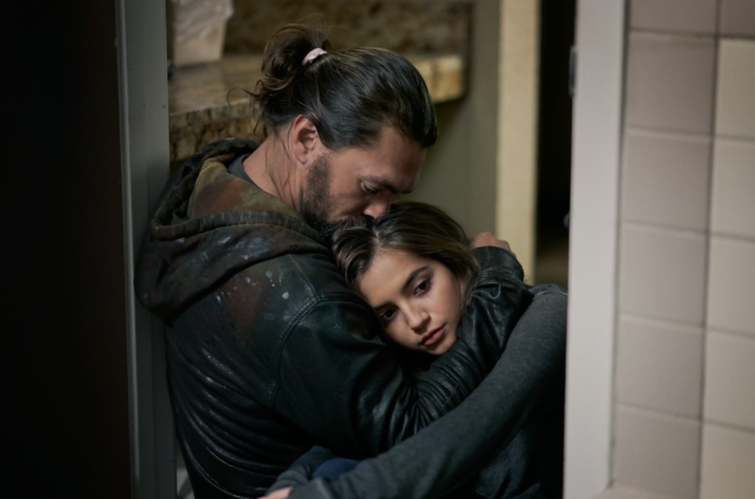 Jason Momoa and Isabela Merced in a still from Sweet Girl.