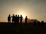 In this Aug. 17, 2021, file photo, young men who say they deserted the Afghan military and fled to Turkey through Iran stand in the countryside in Tatvan, in Bitlis Province in eastern Turkey. In this Aug. 17, 2021, file photo, young men who say they deserted the Afghan military and fled to Turkey through Iran stand in the countryside in Tatvan, in Bitlis Province in eastern Turkey.