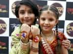 On this day, sisters tie a sacred thread, 'Rakhi' on the wrist of their brothers who promise to protect their sisters all their life. Here are a few pictures of how the country is preparing for the big festival.(PTI)