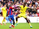 Crystal Palace's Cheikhou Kouyate (L) and Brentford's Ivan Toney battle for the ball during the English Premier League soccer match(AP)