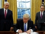 Former US President Donald Trump signs an executive order on US withdrawal from the Trans Pacific Partnership.(Reuters File Photo) Former US President Donald Trump signs an executive order on US withdrawal from the Trans Pacific Partnership.(Reuters File Photo)
