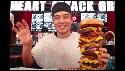 The image shows Matt Stonie with the huge burger.