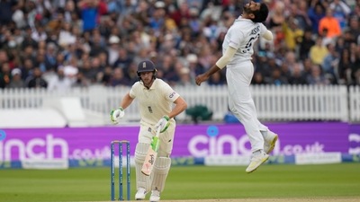 India's Jasprit Bumrah leaps in the air in frustration as India's Virat Kohli fails to catch England's Jos Buttler. (AP) India's Jasprit Bumrah leaps in the air in frustration as India's Virat Kohli fails to catch England's Jos Buttler. (AP)