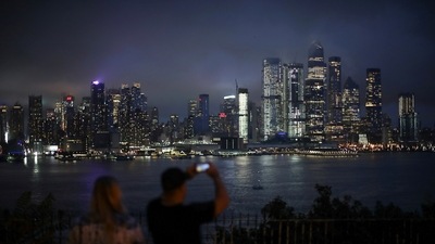 Tropical storm Henri was upgraded to a hurricane. In picture - Clouds pass over middle Manhattan as Tropical Storm Henri passes through New York City. (Reuters)