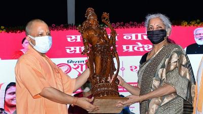 Uttar Pradesh chief minister Yogi Adityanath presents a memento to Union finance minister Nirmala Sitharaman during the launch of Mission Shakti 3.0 in Lucknow on Saturday. (PTI Photo) Uttar Pradesh chief minister Yogi Adityanath presents a memento to Union finance minister Nirmala Sitharaman during the launch of Mission Shakti 3.0 in Lucknow on Saturday. (PTI Photo)