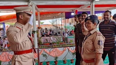 The image shows the ASI mom saluting her DSP son. (Twitter/@dineshdasa1) The image shows the ASI mom saluting her DSP son. (Twitter/@dineshdasa1)
