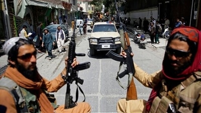 Wang met Mullah Baradar in Kandahar to offer Beijing’s help in the reconstruction of the Islamist Taliban-ruled country. (AP Photo) Wang met Mullah Baradar in Kandahar to offer Beijing’s help in the reconstruction of the Islamist Taliban-ruled country. (AP Photo)