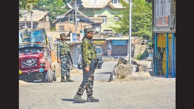 Security personnel stand guard during an encounter, in Pampore, Pulwama, on August 20. (PTI) Security personnel stand guard during an encounter, in Pampore, Pulwama, on August 20. (PTI)