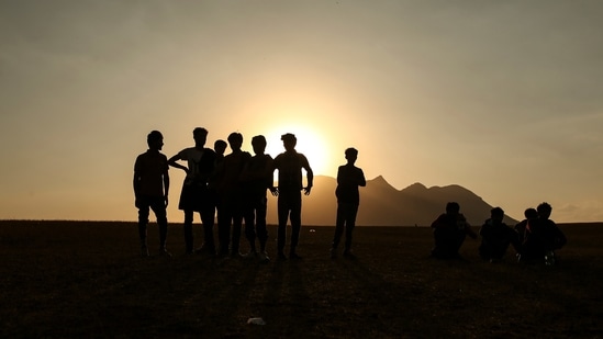 In this Aug. 17, 2021, file photo, young men who say they deserted the Afghan military and fled to Turkey through Iran stand in the countryside in Tatvan, in Bitlis Province in eastern Turkey. (File Photo / AP) In this Aug. 17, 2021, file photo, young men who say they deserted the Afghan military and fled to Turkey through Iran stand in the countryside in Tatvan, in Bitlis Province in eastern Turkey. (File Photo / AP)