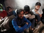 Migrants, mainly from Afghanistan, are seen after they were detained by Turkish security forces during an operation in the border city of Van, Turkey late August 21, 2021. 