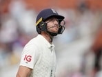 England's Jos Buttler looks dejected.