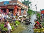 While in Hajipur people have moved to higher altitudes along with their cattle and family making it difficult for them to survive. (PTI Photo)(PTI) While in Hajipur people have moved to higher altitudes along with their cattle and family making it difficult for them to survive. (PTI Photo)(PTI)