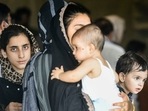 People who were stranded in crisis-hit Afghanistan arrive by a special repatriation flight of IAF at the Hindan Air Force Station, in Ghaziabad, on Sunday. People who were stranded in crisis-hit Afghanistan arrive by a special repatriation flight of IAF at the Hindan Air Force Station, in Ghaziabad, on Sunday.