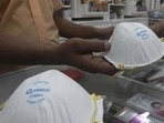 A customer buys N95 mask from a medical shop in Pune (File Photo/used only for representative purpose) A customer buys N95 mask from a medical shop in Pune (File Photo/used only for representative purpose)