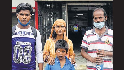 Dalbir Singh, who recently lost his father, waits at the Ludhiana railway station with his family. (HT Photo) Dalbir Singh, who recently lost his father, waits at the Ludhiana railway station with his family. (HT Photo)
