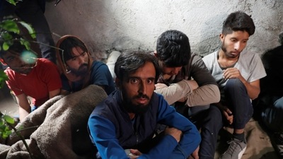 Migrants, mainly from Afghanistan, are seen after they were detained by Turkish security forces during an operation in the border city of Van, Turkey late August 21, 2021. (Murad Sezer / REUTERS)