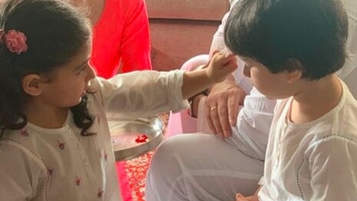 This photo of Taimur Ali Khan and Inaaya Kemmu was shared by Soha Ali Khan on Raksha Bandhan 2020. Inaaya, with those little hands, ties the sacred thread 'rakhi' on the wrist of her brother and best friend Taimur Ali Khan. (Instagram/@sakpataudi)