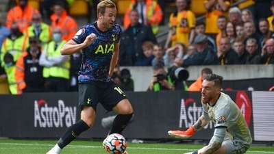 Tottenham's Harry Kane has a shot on goal during the English Premier League soccer match against Wolverhampton Wanderers (AP) Tottenham's Harry Kane has a shot on goal during the English Premier League soccer match against Wolverhampton Wanderers (AP)
