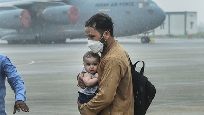 Several children were evacuated from Kabul by the IAF. (PTI Photo/Arun Sharma) (PTI) Several children were evacuated from Kabul by the IAF. (PTI Photo/Arun Sharma) (PTI)