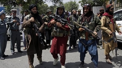 The Taliban fighters, usually seen in traditional clothes and brandishing AK-47 assault rifles, (AP Photo)