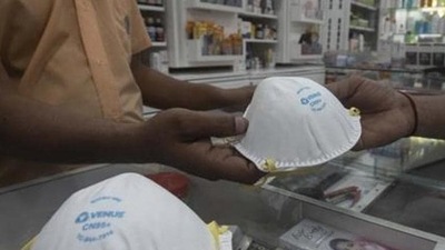 A customer buys N95 mask from a medical shop in Pune (File Photo/used only for representative purpose)