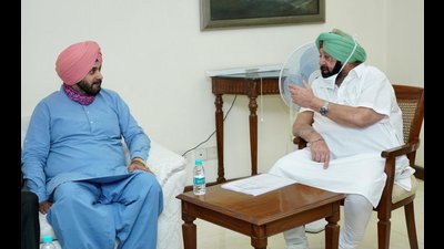 Punjab chief minister Captain Amarinder Singh with state Congress chief Navjot Singh Sidhu Punjab chief minister Captain Amarinder Singh with state Congress chief Navjot Singh Sidhu